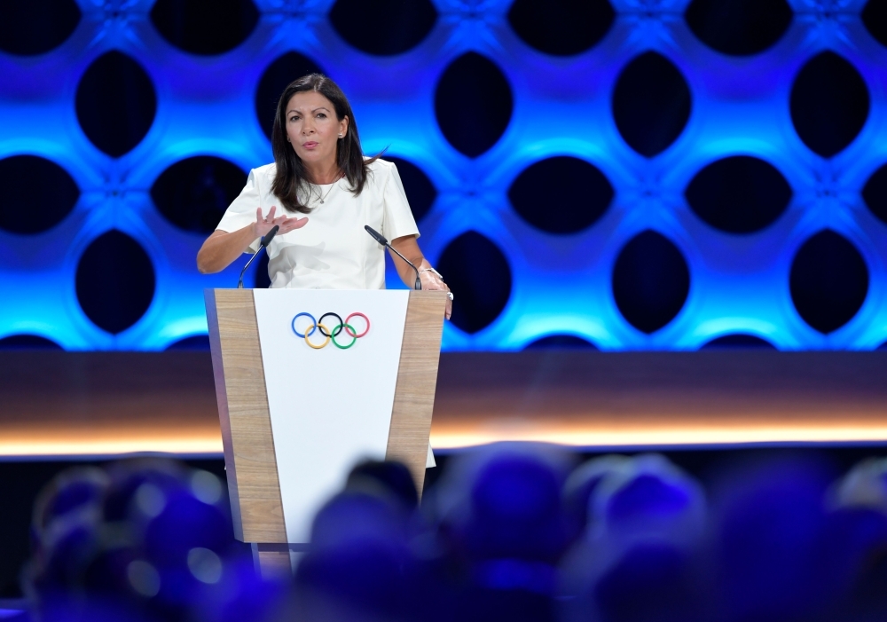 In this file photo taken on September 13, 2017 a picture shows the Olympics Rings on the Trocadero  Esplanade near the Eiffel Tower in Paris, after the  International Olympic Committee named Paris host city of the 2024 Summer Olympic Games. Energy giants Total has ruled out sponsoring the 2024 Olympics in Paris, keen to avoid being 