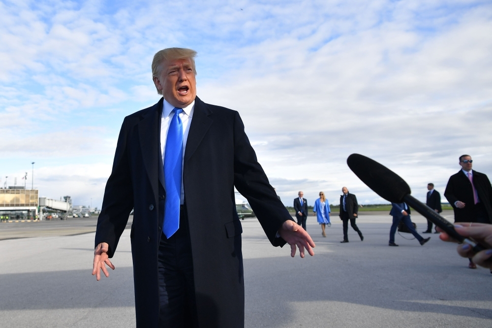 US President Donald Trump speaks to medias before boarding Air Force One at Shannon Airport in Shannon, Ireland, on Thursdayand fly to Normandy, France, to attend the 75th D-Day Anniversary.  — AFP