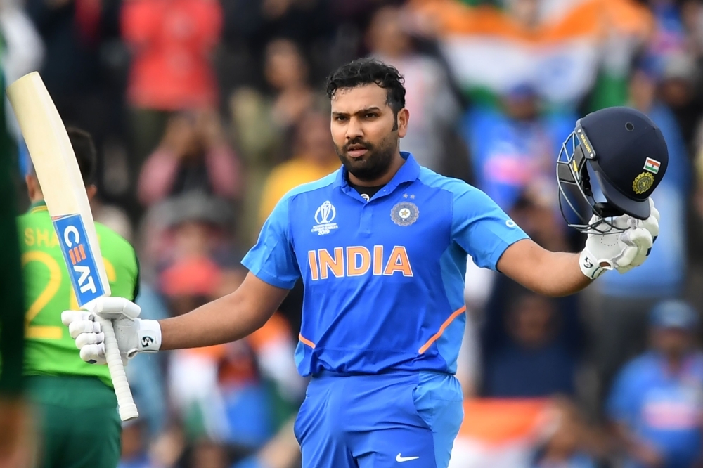 India's Rohit Sharma celebrate reaching his century during the 2019 Cricket World Cup group stage match between South Africa and India at the Rose Bowl in Southampton, southern England, on Wednesday. — AFP