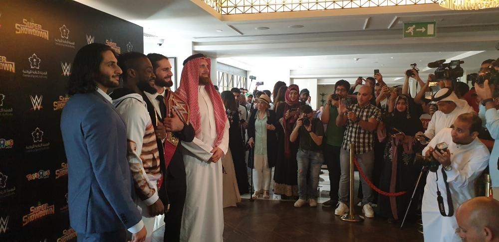 WWE stars Seth Rollins, Mojo Rawley, Kofi Kingston and the first Saudi Arabia professional wrestler currently signed with WWE, Mansoor Al-Shehail enjoy time with media on Thursday at Galleria hotel here in Jeddah. — Courtesy photo