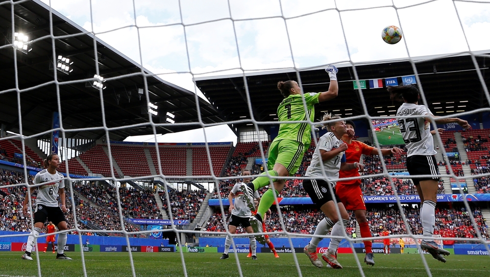 Germany's defender Giulia Gwinn (L) scores a goal during the France 2019 Women's World Cup Group B football match against China, on Saturday, at the Roazhon Park stadium in Rennes, western France. — AFP