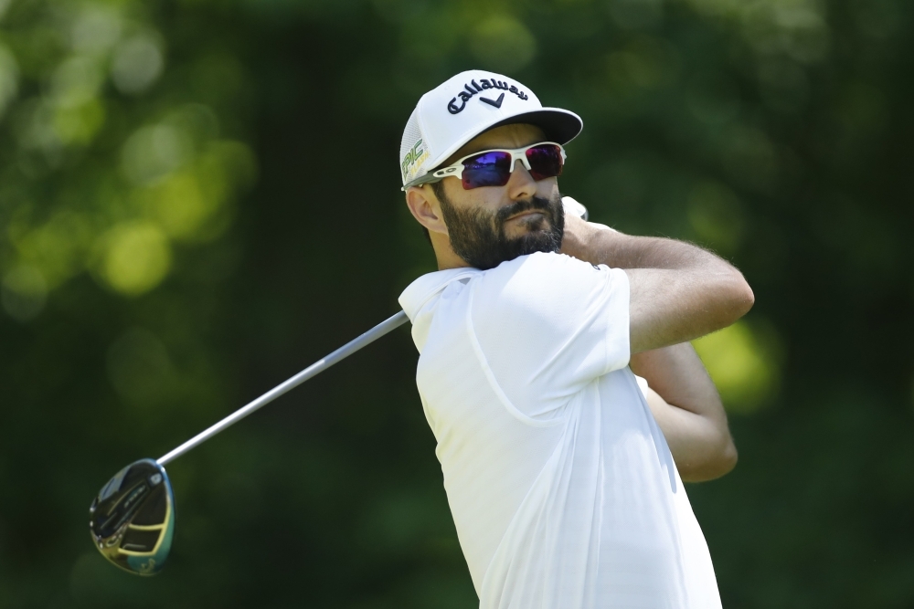 Adam Hadwin of Canada plays his shot from the seventh tee during the second round of the RBC Canadian Open at Hamilton Golf and Country Club on Friday in Hamilton, Canada. — AFP