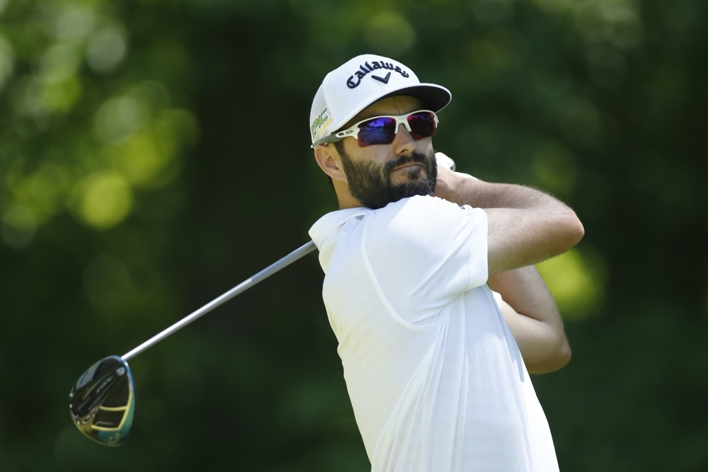 Adam Hadwin of Canada plays his shot from the seventh tee during the second round of the RBC Canadian Open at Hamilton Golf and Country Club on Friday in Hamilton, Canada. — AFP