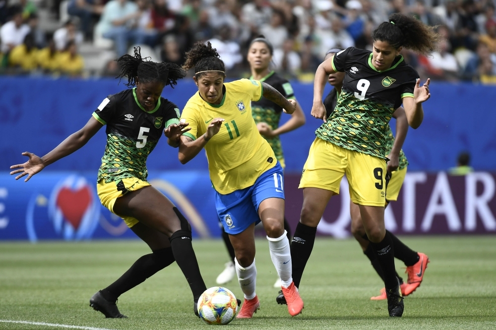 Brazil's forward Cristiane (C) celebrates after scoring a goal during the France 2019 Women's World Cup Group C football match against Jamaica on Sunday at the Alpes Stadium in Grenoble, central-eastern France. — AFP 