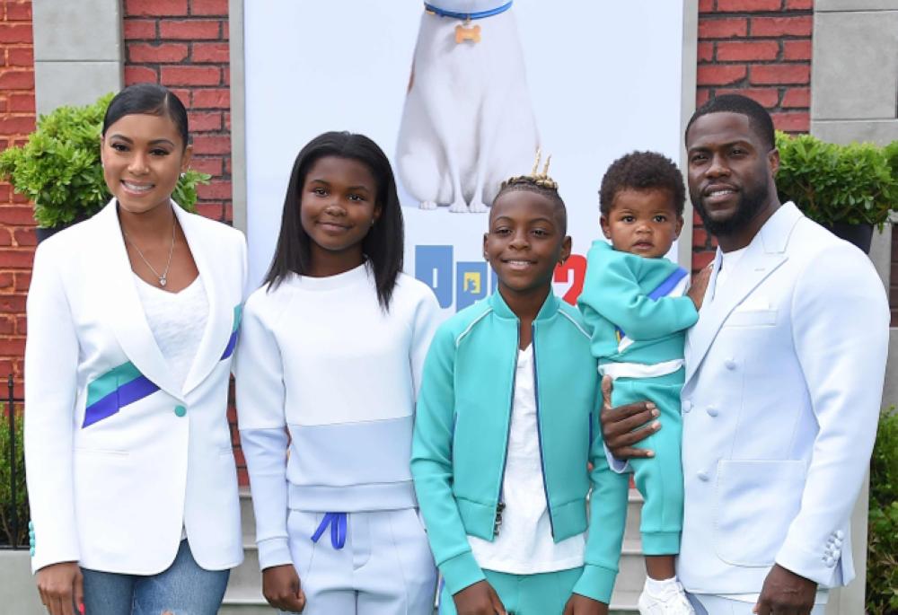In this file photo taken on June 2, 2019 Actor Kevin Hart (R), his wife Eniko Parish (L) and children Hendrix, Heaven and Kenzo walk the carpet at the 'The Secret Life of Pets 2' Los Angeles Premiere at Regency Village Theater in Westwood, California. — AFP
