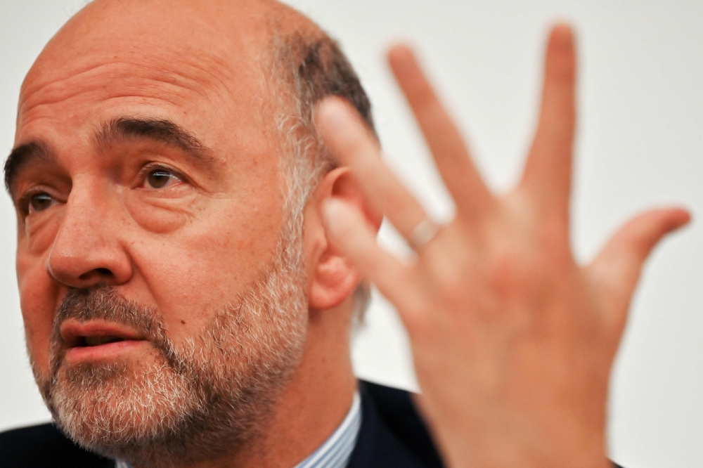 European Commissioner for Economic and Financial Affairs, Taxation and Customs Pierre Moscovici attends a press conference in Tokyo on Monday. — AFP
