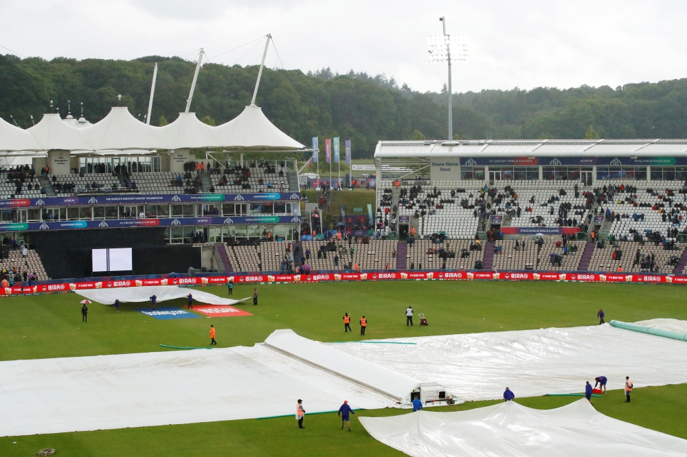 General view as the big screen displays a message notifying spectators the ICC Cricket World Cup match between South Africa and West Indies has been abandoned on Monday. — Reuters