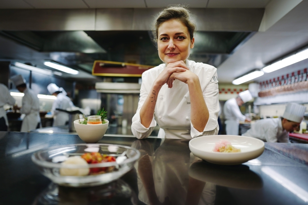 French pastry chief Jessica Prealpato of the Plaza Athenee hotel poses in her restaurant's kitchen for a portrait in Paris. — AFP