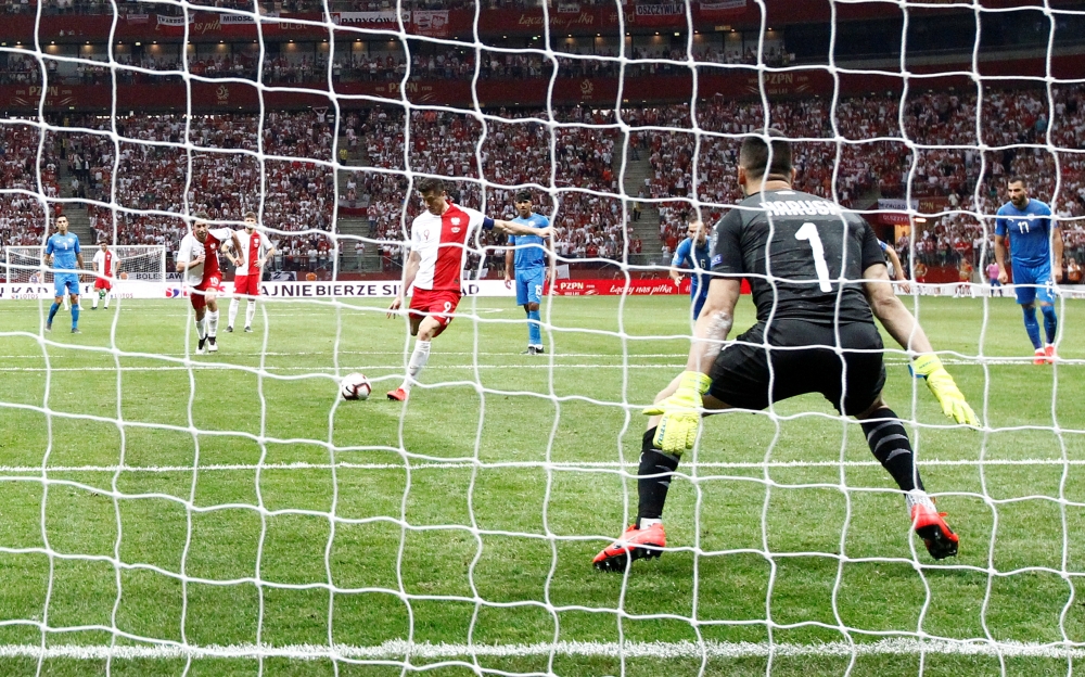 Poland's Robert Lewandowski scores their second goal from the penalty spot against Israel in the Euro 2020 Qualifier Group G  match at the National Stadium Warsaw, Warsaw, Poland, on Monday. — Reuters