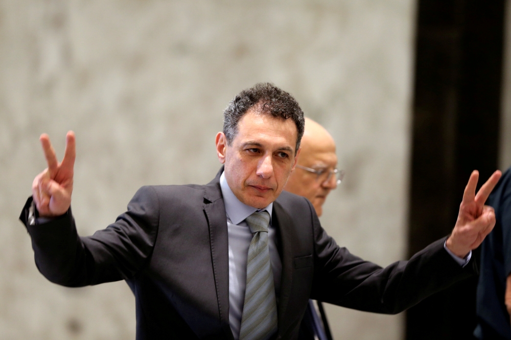 Freed Lebanese IT specialist Nizar Zakka, who had been detained in Iran since 2015, gestures as he arrives at the presidential palace in Baabda, Lebanon, on Tuesday. — Reuters
