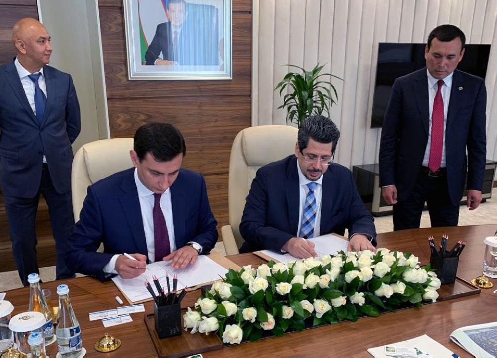 An agreeemnt was signed by Ayman Sejiny, CEO of ICD. and Sardor Normukhamedov, chairman of the Board of the Trustbank, on Monday in Ubekistan. — Courtesy photo