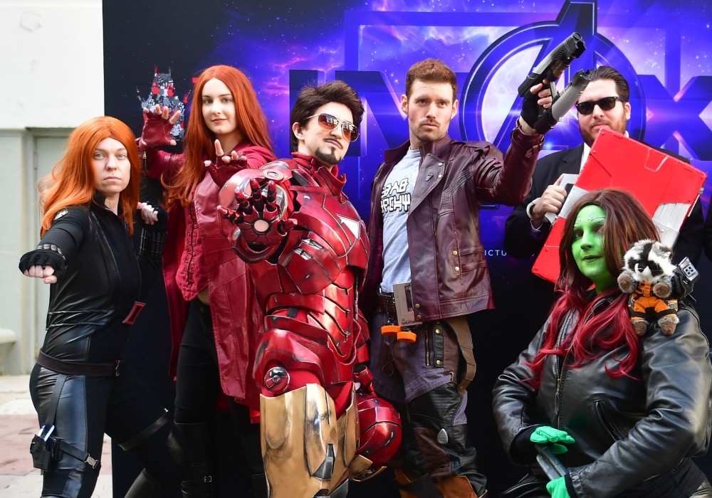Fans of the Avengers arrive for a costume contest before the first screening of 