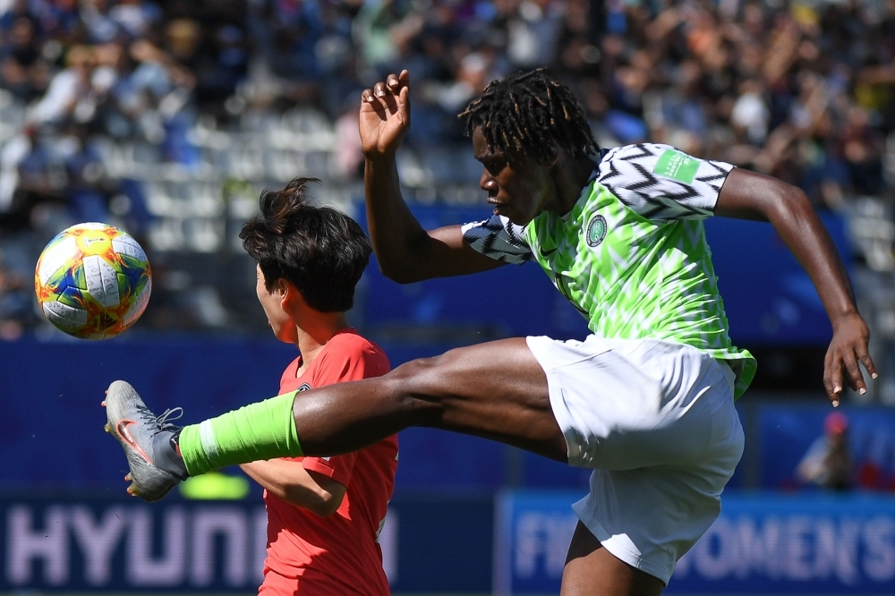 Nigeria's Asisat Oshoala scores their second goal against South Korea during the France 2019 Women's World Cup Group A football match at the Alpes Stadium in Grenoble, central-eastern France, on Wednesday. — Reuters
