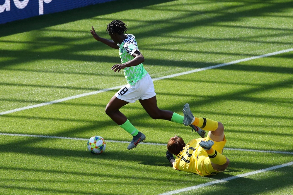 Nigeria's Asisat Oshoala scores their second goal against South Korea during the France 2019 Women's World Cup Group A football match at the Alpes Stadium in Grenoble, central-eastern France, on Wednesday. — Reuters
