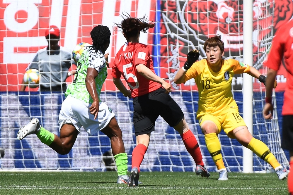 Nigeria's Asisat Oshoala scores their second goal against South Korea during the France 2019 Women's World Cup Group A football match at the Alpes Stadium in Grenoble, central-eastern France, on Wednesday. — Reuters