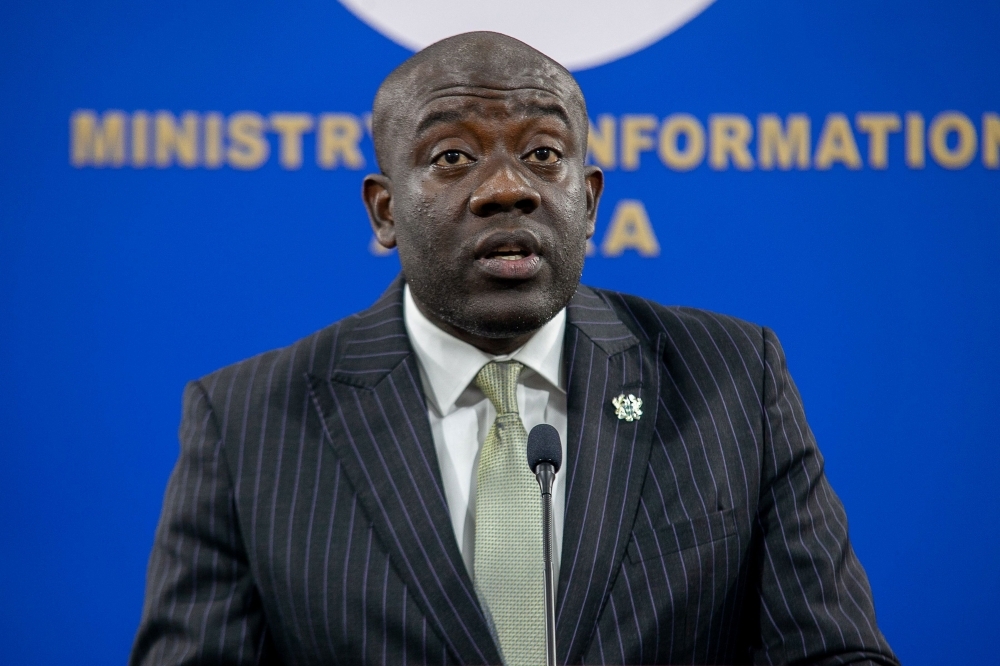 Ghanaian Information Minister Kojo Opong Inkromah addresses a press conference on Wednesday following the rescue and arrest of suspects who kidnapped two Canadian women. — AFP