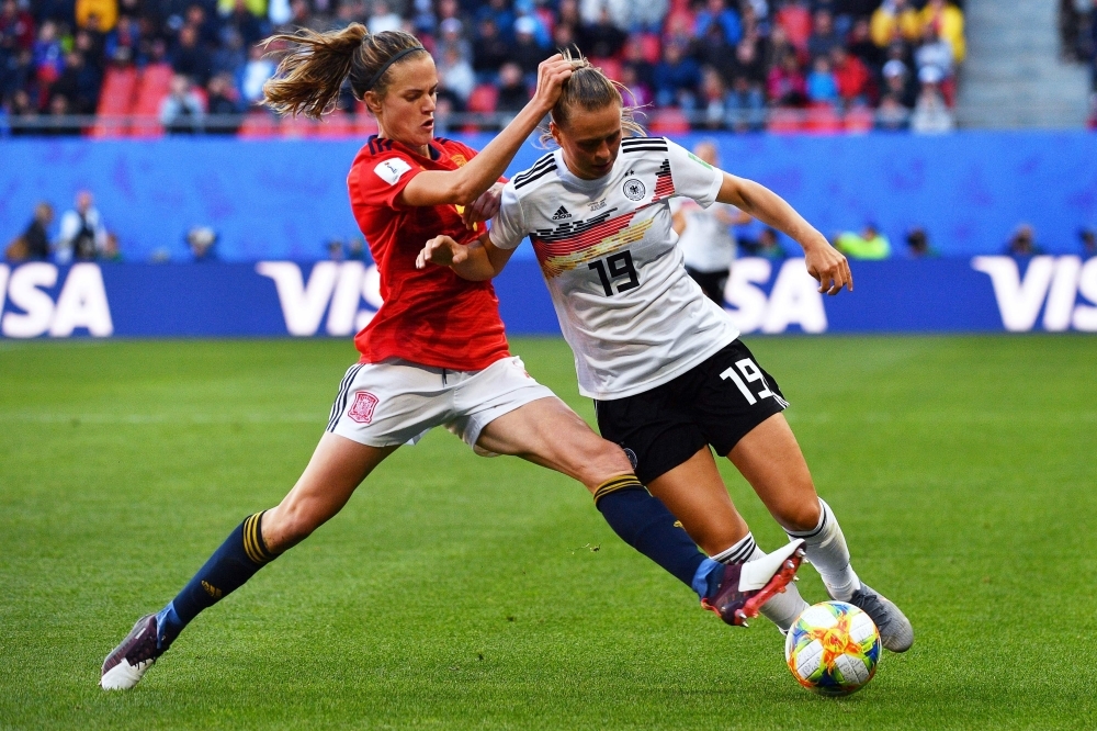 Spain's defender Irene Paredes (L) vies for the ball with Germany's forward Klara Buhl during the France 2019 Women's World Cup Group B football match on Wednesday, at the Hainaut Stadium in Valenciennes, northern France. — AFP