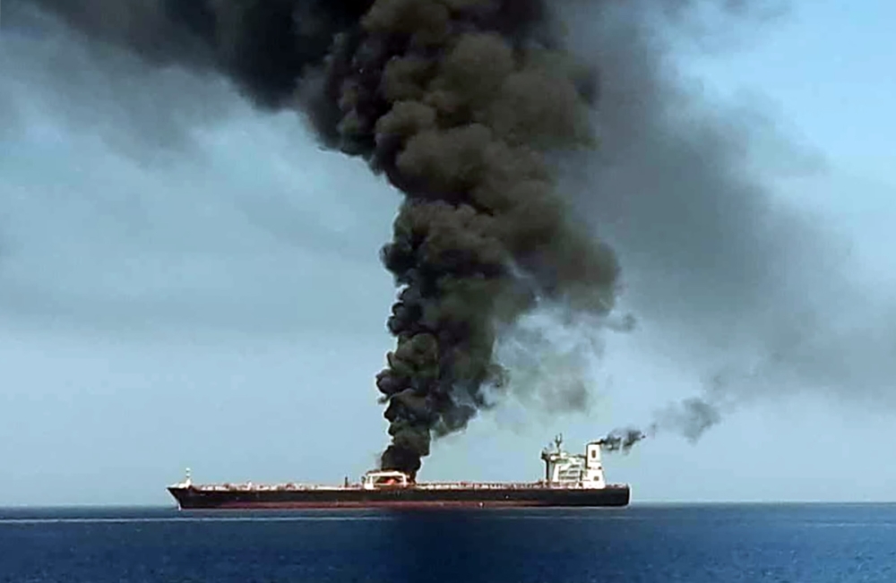 A picture obtained by AFP on Thursday reportedly shows fire and smoke billowing from a tanker said to have been attacked in the waters of the Gulf of Oman. — AFP