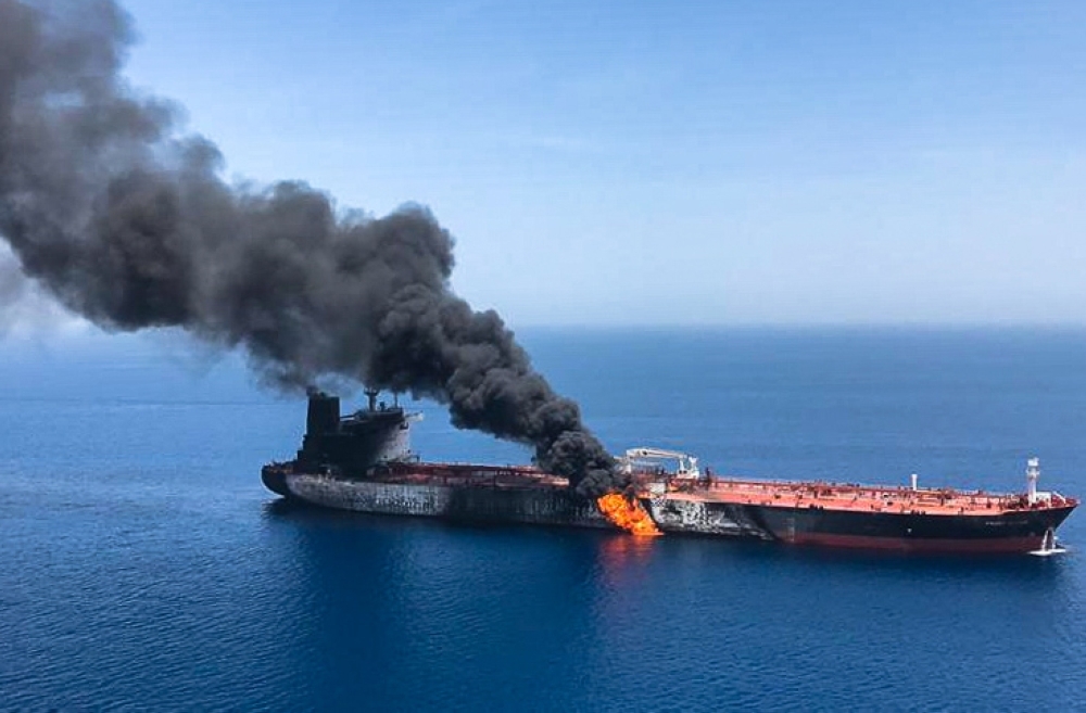 A picture obtained by AFP on Thursday reportedly shows fire and smoke billowing from a tanker said to have been attacked in the waters of the Gulf of Oman. — AFP