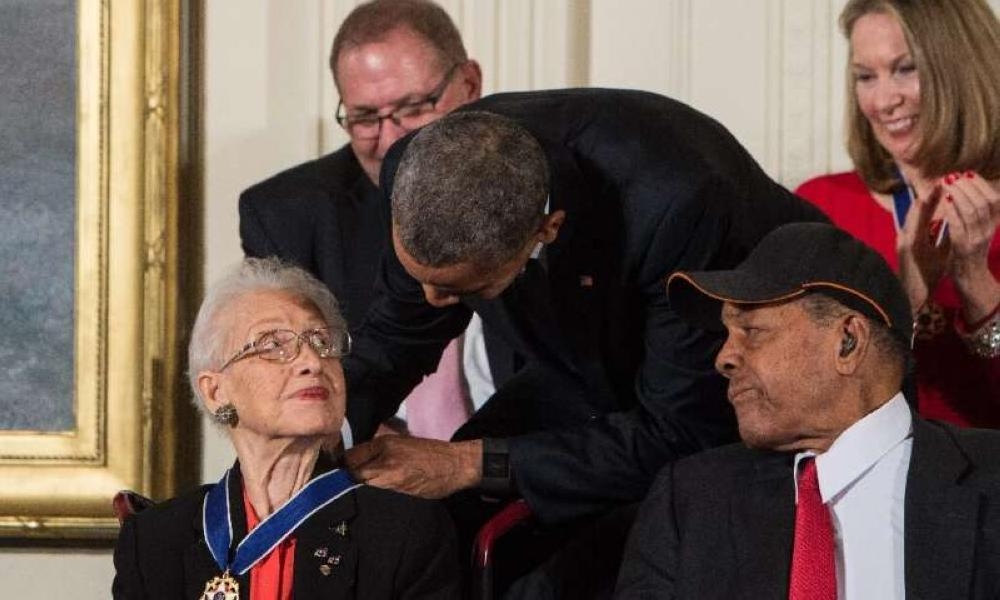 File photo shows Katherine Johnson receiving the Presidential Medal of Freedom from Barack Obama. She provided pivotal contributions to American space flight research alongside Dorothy Vaughan and Mary Jackson.