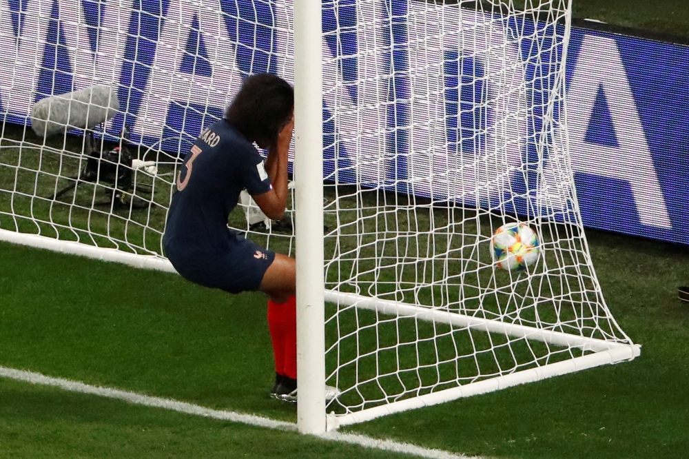 France's Wendie Renard reacts after scoring an own goal and the first for Norway during the France 2019 Women's World Cup Group A football match on Wednesday at the Nice Stadium in Nice, southeastern France. — Reuters