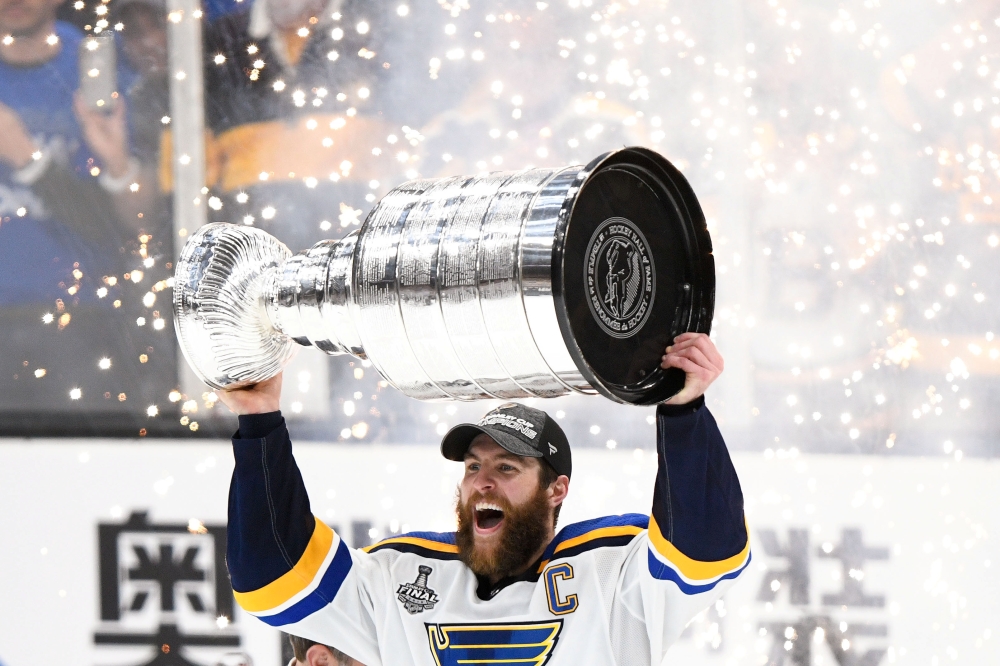 St. Louis Blues defenseman Alex Pietrangelo (27) holds the Stanley Cup after the Blues defeated the Boston Bruins in game seven of the 2019 Stanley Cup Final at TD Garden. — Reuters