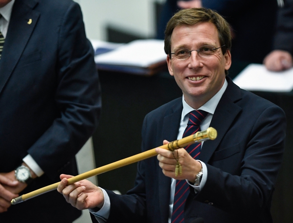 Newly elected mayor of Madrid Spanish conservative Popular Party (PP) party candidate Jose Luis Martinez Almeida acknowledges applause after being elected on Saturday in Madrid. — AFP 