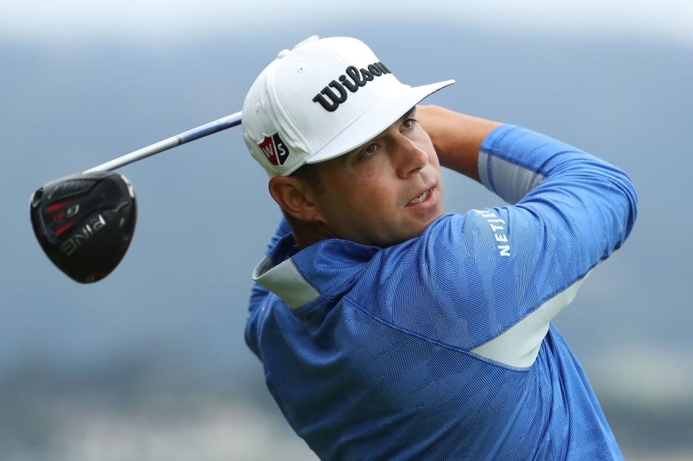 Gary Woodland of the United States plays a shot from the 14th tee during the third round of the 2019 US Open at Pebble Beach Golf Links on Saturday in Pebble Beach, California. — AFP