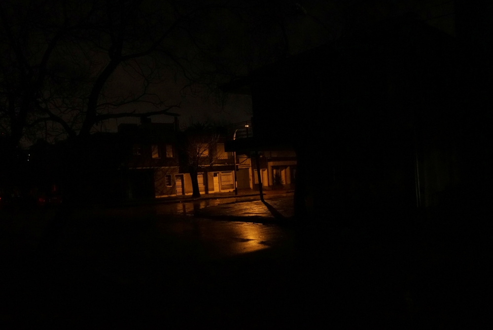 A lamppost shines down a street as the rest of the neighborhood Parque Batlle goes without electricity, although power has mostly been restored after a massive blackout in Argentina cut electricity to much of neighboring Uruguay and swaths of Paraguay, in Montevideo, Uruguay, on Sunday. — Reuters
