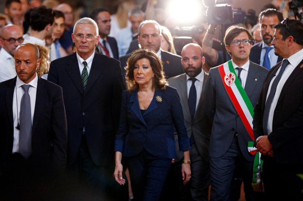 Italian Senate President Maria Elisabetta Alberti Casellati attends a tribute ceremony to Zeffirelli's coffin in Florence, Italy, Monday. Zeffirelli died on Saturday at the age of 96. — Reuters