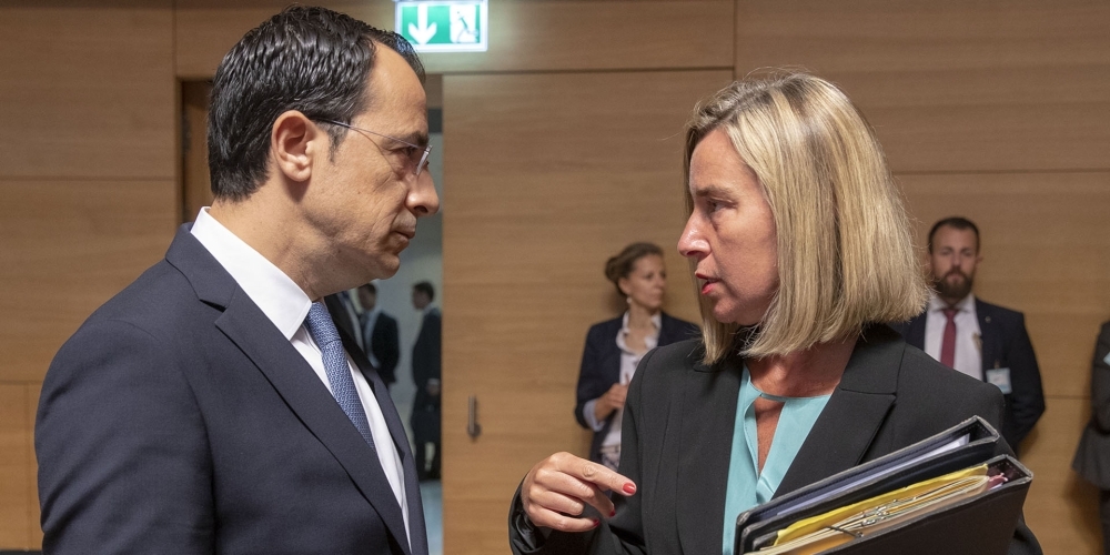 Cypriot Minister of Foreign Affairs Nikos Christodoulides (L) meets with European Union Foreign Policy Chief Federica Mogherini during the EU Foreign Affairs Council, in Luxembourg on Monday. — AFP