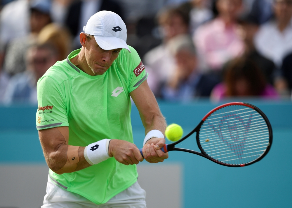 South Africa's Kevin Anderson in action during his first round match against Britain's Cameron Norrie in the ATP 500 Fever-Tree Championships at The Queen's Club, London, Britain, on Monday. — Reuters