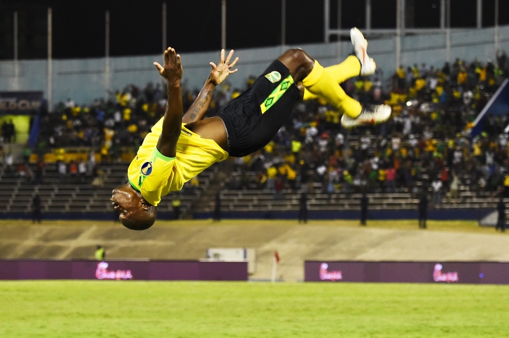 Jamaica's Brian Brown (No. 18) fights for the ball with Honduras's Maynor Figueroa (No. 3) during the 2019 Concacaf Gold Cup match between Jamaica and Honduras on Monday at Independence Park in Kingston. — AFP 