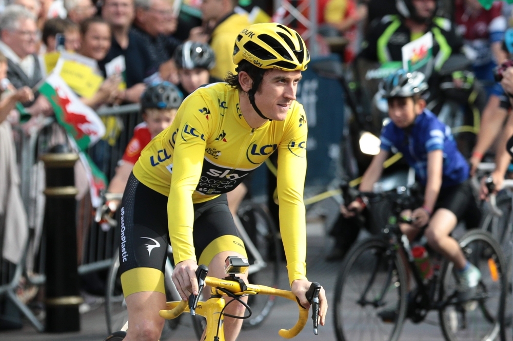 In this file photo taken on Aug. 9, 2018. Britain's Geraint Thomas rides during a celebratory homecoming event in Cardiff, south Wales following Thomas's victory in the Tour de France cycling race. Geraint Thomas of team Ineos fell heavily Tuesday during the Tour de Suisse (Tour of Switzerland) cycling race near Lausanne. Thomas came down heavily in the peloton's high-pace pursuit of an escape, and was still sitting ashen-faced on the tarmac five minutes later with doctors gingerly examining his shoulder. — AFP