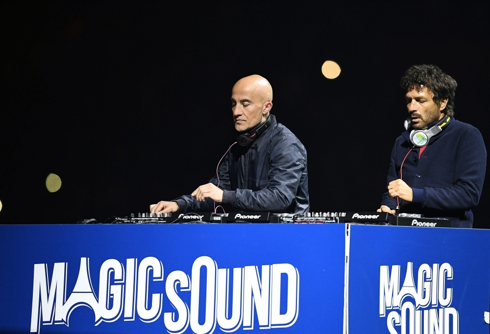 French DJ duo Cassius, Philippe Zdar, right, and Hubert Boombass, left, are pictured during the French L1 football match between Paris Saint-Germain and Nantes at the Parc des Princes stadium in Paris in this May 14, 2016 file photo. — AFP