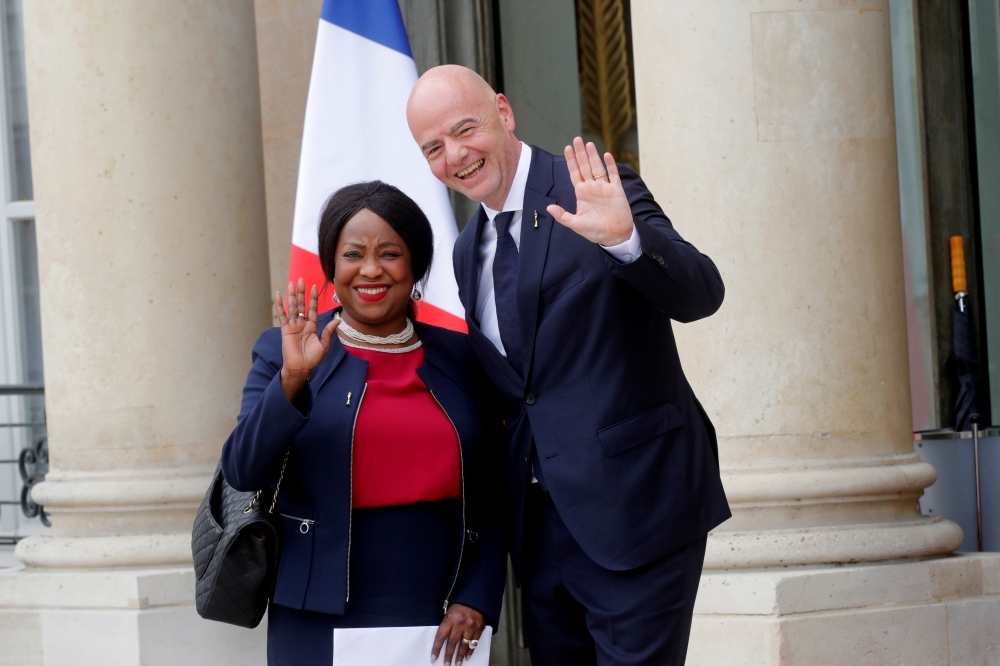 FIFA President Gianni Infantino and FIFA Secretary General Fatma Samba Diouf Samoura arrive for a meeting at the Elysee Palace in Paris, France, in this June 4, 2019, photo. — Reuters
