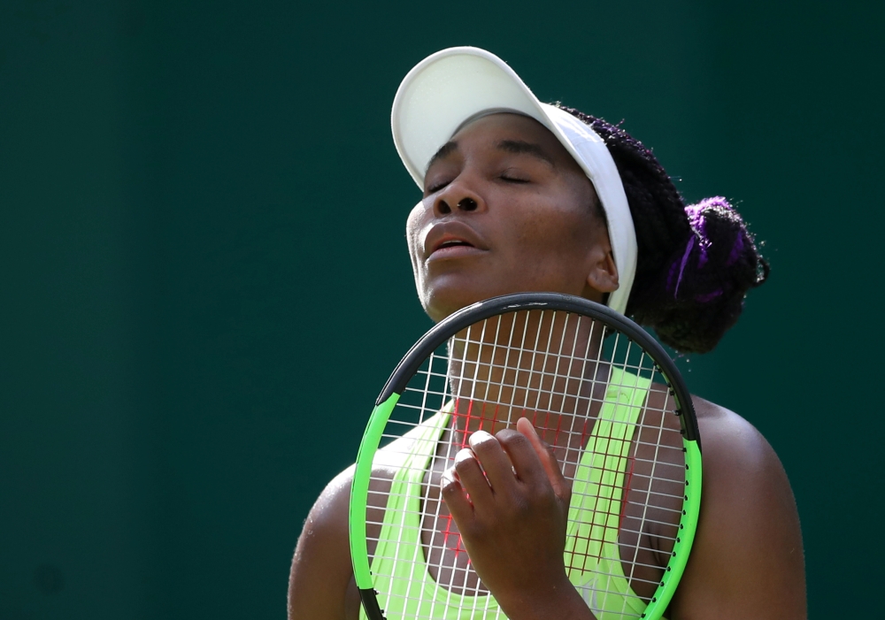Venus Williams of the US reacts during her quarterfinal match against Australia's Ashleigh Barty in the WTA Premier Nature Valley Classic event at the Edgbaston Priory Club, Edgbaston, Birmingham, Britain, on Friday. — Reuters
