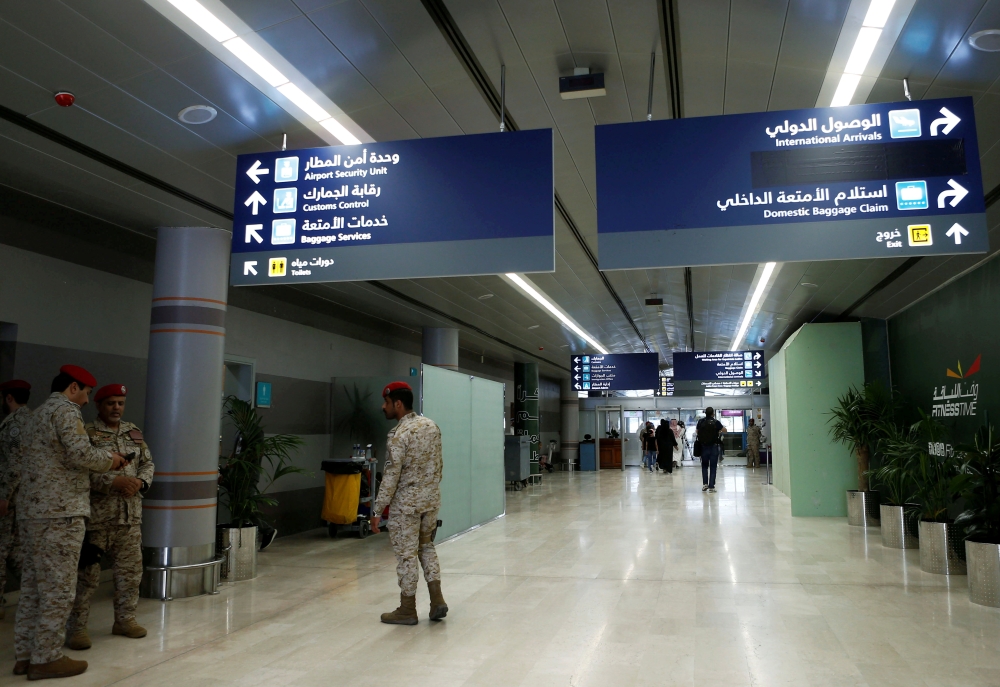 Saudi security officers at Abha airport after it was attacked by Yemen's Houthi terrorist militias. — Reuters