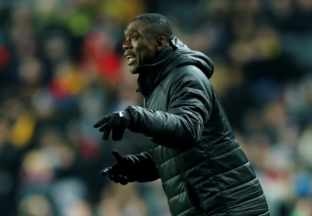 Cameroon coach Clarence Seedorf seen in this Nov. 20, 2018 file photo during the International friendly against  Brazil v Cameroon at the Stadium MK, Milton Keynes, Britain. — Reuters