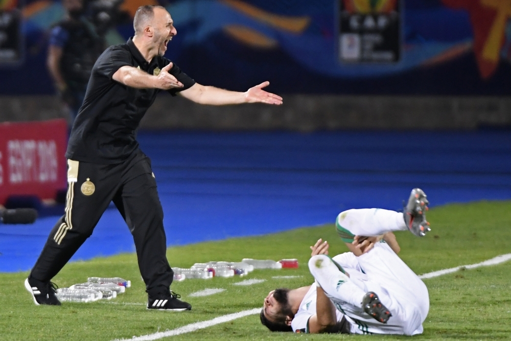 Algeria's coach Djamel Belmadi gives his instructions during the 2019 Africa Cup of Nations (CAN) football match against Kenya at the 30 June Stadium in Cairo on Sunday. — AFP