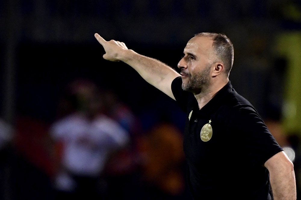 Algeria's coach Djamel Belmadi gives his instructions during the 2019 Africa Cup of Nations (CAN) football match against Kenya at the 30 June Stadium in Cairo on Sunday. — AFP