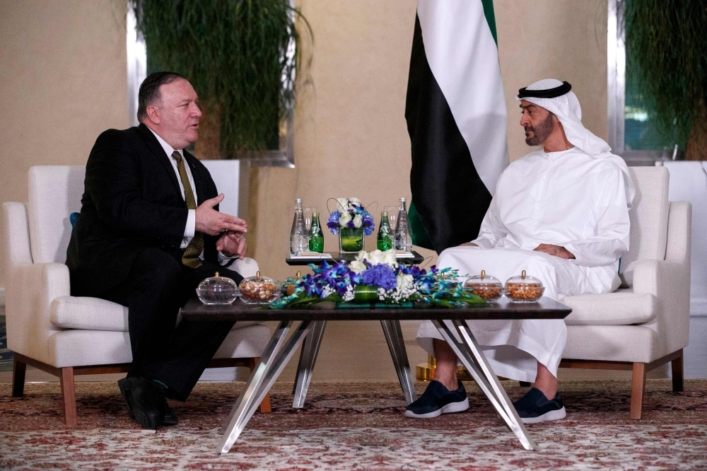 US Secretary of State Mike Pompeo, left, meets with Abu Dhabi Crown Prince Mohammed Bin Zayed in Abu Dhabi on Monday. — AFP