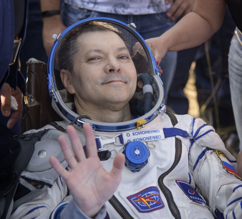 This handout photo released by NASA shows Expedition 59 crew member Oleg Kononenko of Roscosmos outside the Soyuz MS-11 spacecraft after he, NASA astronaut Anne McClain, and Canadian Space Agency astronaut David Saint-Jacques landed in a remote area near the town of Dzhezkazgan, Kazakhstan on Tuesday. - AFP
 