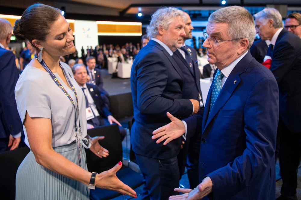 Member of the delegation from Stockholm/Are 2026 Winter Olympics, Sweden's Crown Princess Victoria (L) and International Olympic Committee (IOC) president Thomas Bach react after Stockholm/Are was not elected to host the 2026 Olympic Winter Games during the 134th session of the International Olwasympic Committee (IOC), in Lausanne on Monday. — AFP