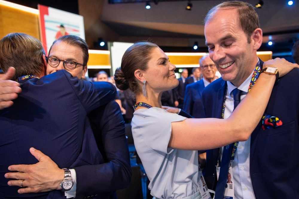 Member of the delegation from Stockholm/Are 2026 Winter Olympics, Sweden's Crown Princess Victoria (L) and International Olympic Committee (IOC) president Thomas Bach react after Stockholm/Are was not elected to host the 2026 Olympic Winter Games during the 134th session of the International Olwasympic Committee (IOC), in Lausanne on Monday. — AFP