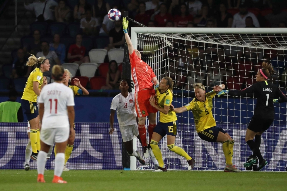 Sweden's goalkeeper Hedvig Lindahl saves a penalty kick in the match against Canada in the during the France 2019 Women's World Cup round of sixteen football match at the Parc des Princes stadium in Paris, on Monday. — AFP