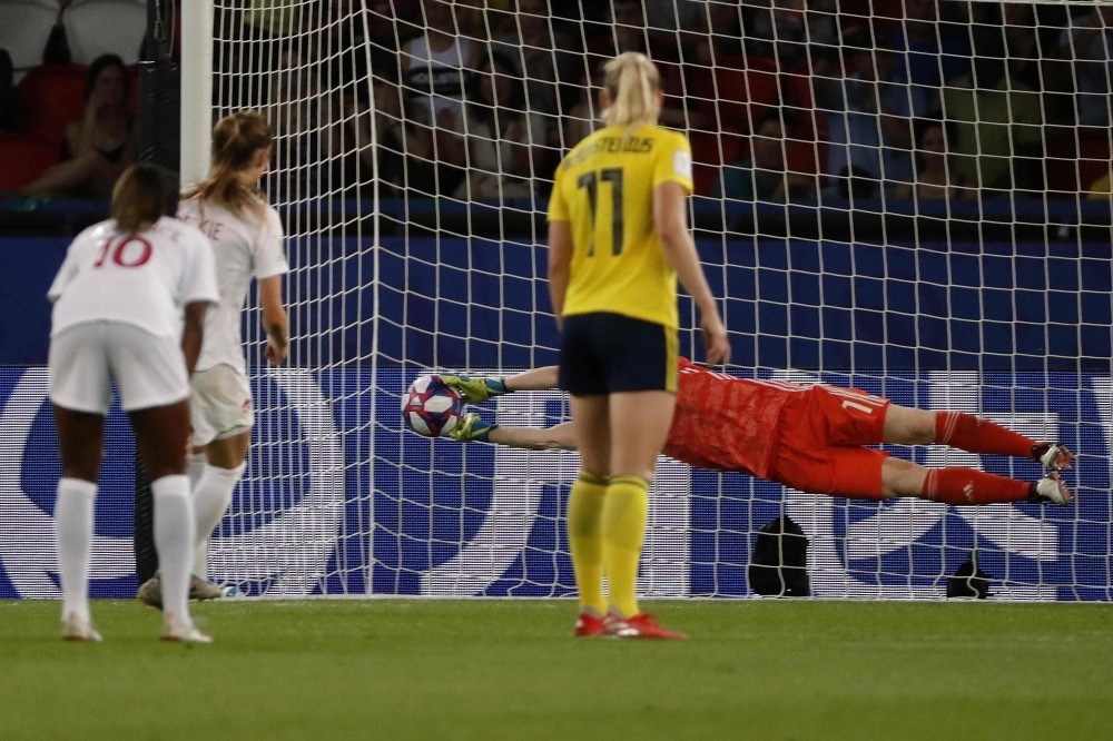 Sweden's goalkeeper Hedvig Lindahl saves a penalty kick in the match against Canada in the during the France 2019 Women's World Cup round of sixteen football match at the Parc des Princes stadium in Paris, on Monday. — AFP