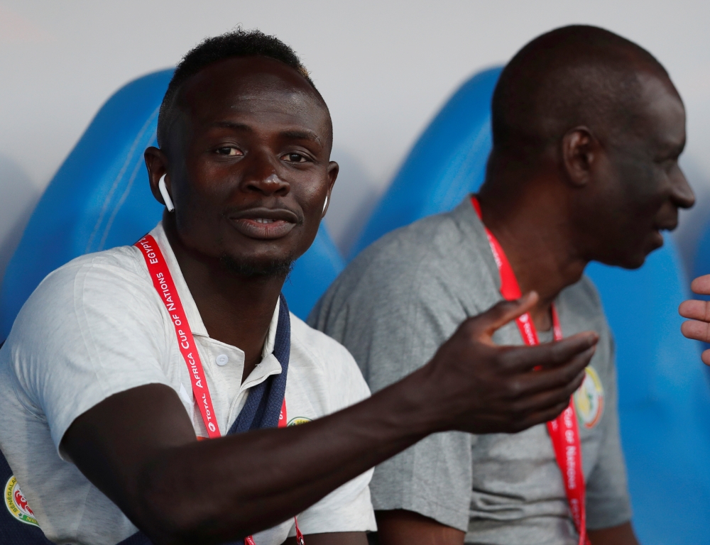 Senegal's Sadio Mane sits on the bench during the Africa Cup of Nations 2019 Group C match against Tanzania at the 30 June Stadium, Cairo, Egypt -on Sunday. — Reuters