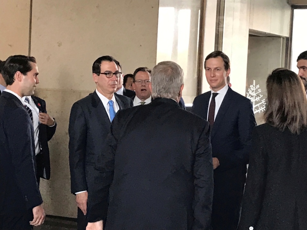 White House senior adviser Jared Kushner and Treasury Secretary Steven Mnuchin arrive at Manama's Four Seasons hotel, the venue for the US-hosted 