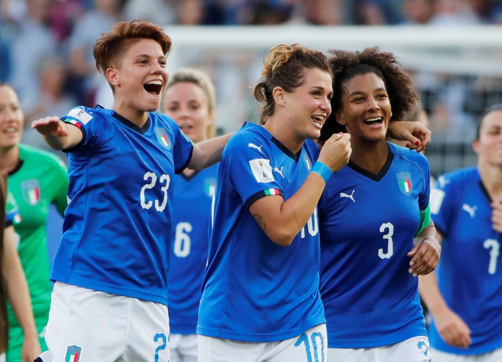 Italy's Manuela Giugliano, Cristiana Girelli and Sara Gama celebrate after the Women's World Cup  round of 16 match against China at the Stade de La Mosson, Montpellier, France on Tuessday. — Reuters